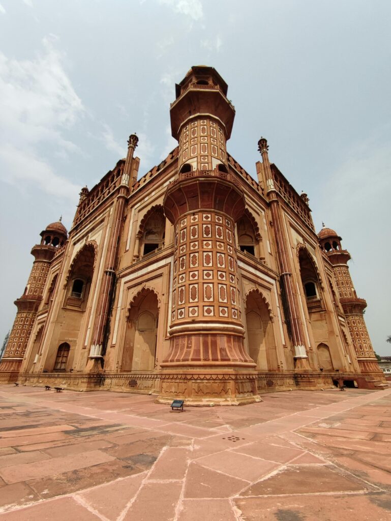 pexels-photo-11020789-11020789 A striking view of Safdarjung's Tomb showcasing its intricate Mughal architecture under a clear sky.